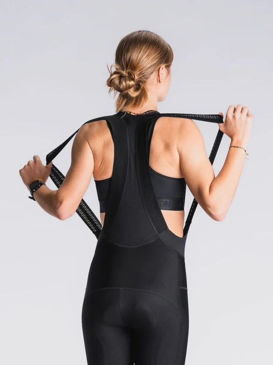 Womens-long-bib-tights_1234_Black_94_v1-9535526_a6a91869-8c4a-4f50-b24d-7aeb86a41d10.webp